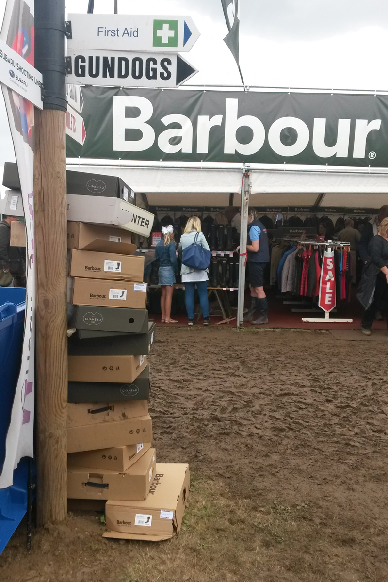 Discarded Welly Boxes at a Muddy Game Fair
